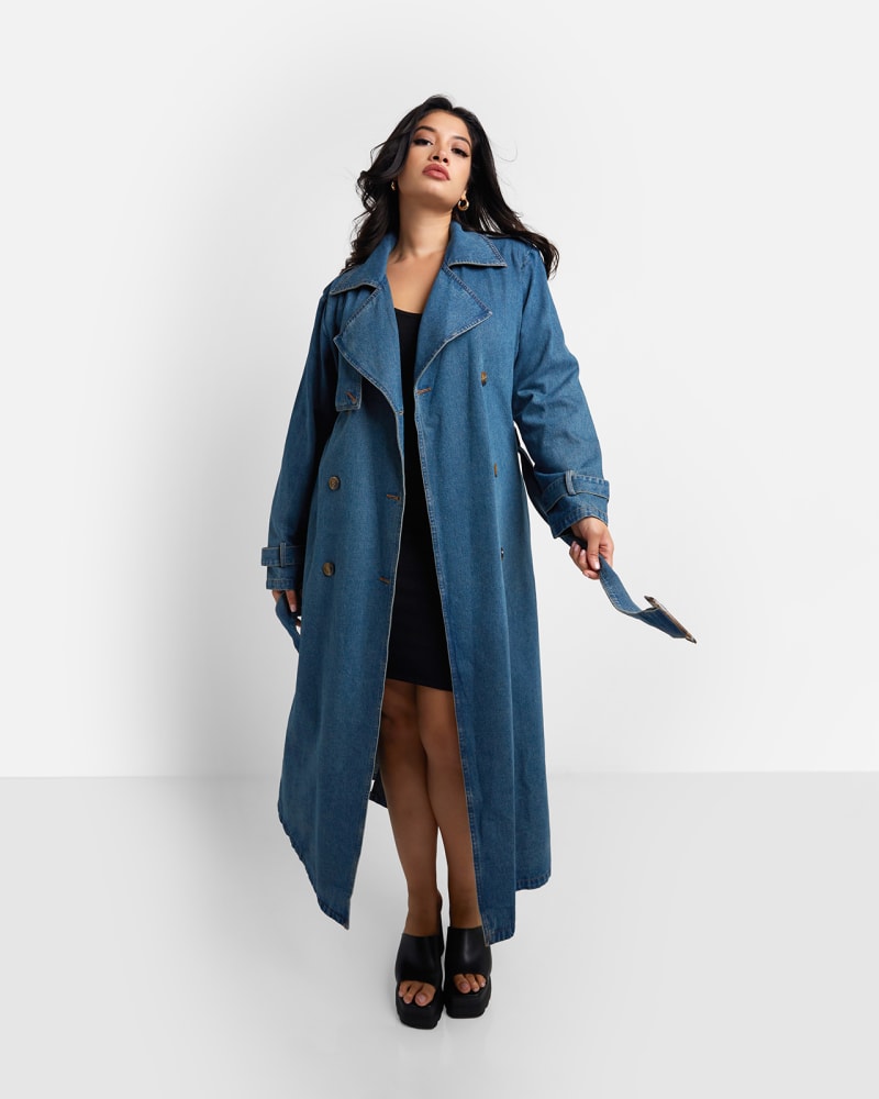 Front of a model wearing a size L Livie Denim Longline Trench Coat - Medium Blue in Blue by Rebdolls. | dia_product_style_image_id:324295
